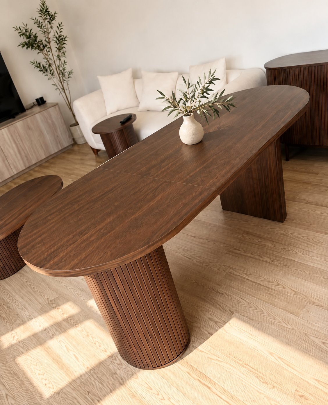 Nora Oval — Walnut finish, fluted pedestal · 71" · seats 6