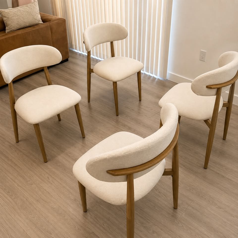 Sol&egrave;ne Set — four boucl&eacute; chairs, three-quarter view